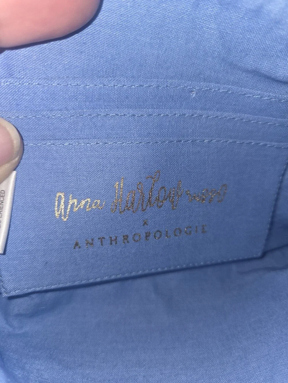 Anthropologie Light Blue Embroidered Floral Tassel Pouch with 'H' Monogram